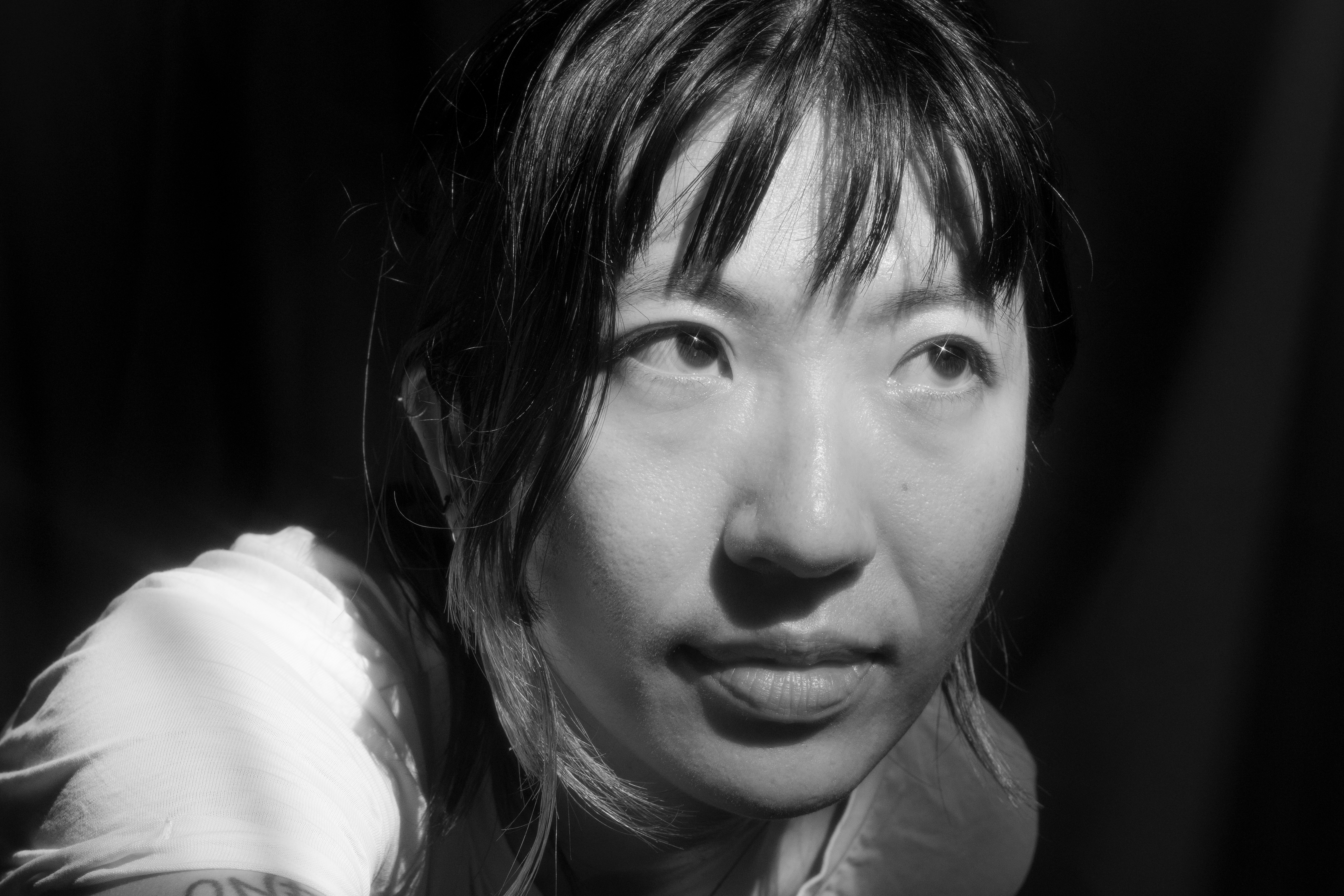 Black and white photo of artist Frances Chang